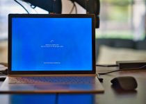 Photo by Clint Patterson macbook pro on brown wooden table